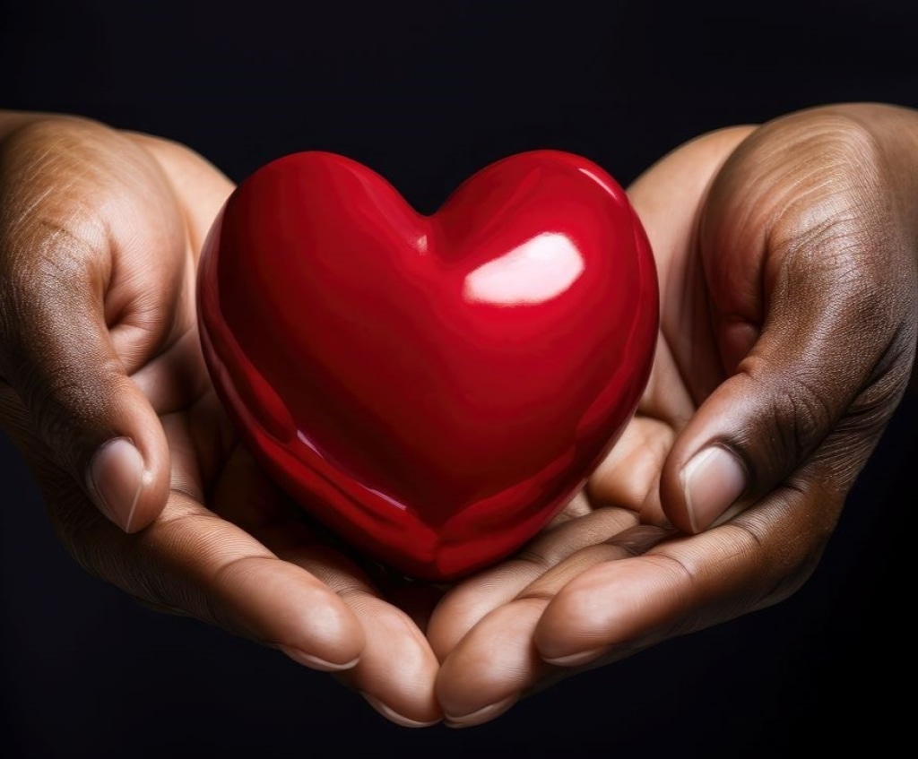 hands holding a heart shaped object